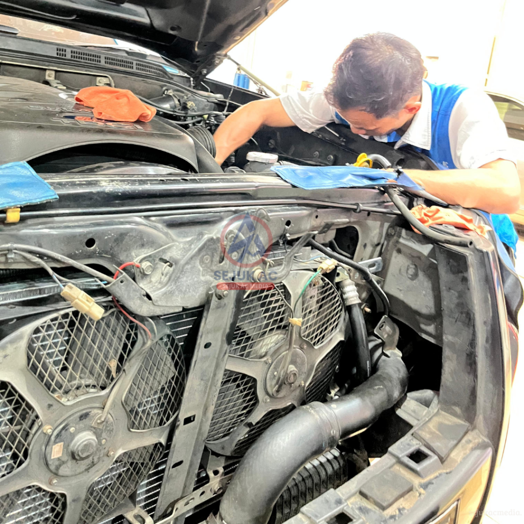 AC mobil dari bensin atau aki